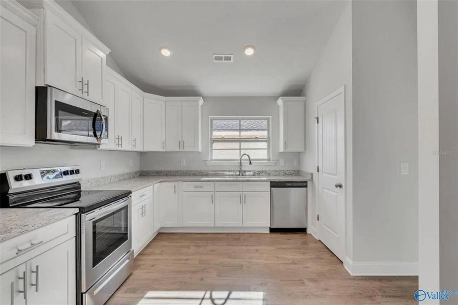 Furnished interior view inside a new home in Kirkland Farms, Alachua (Image 2).