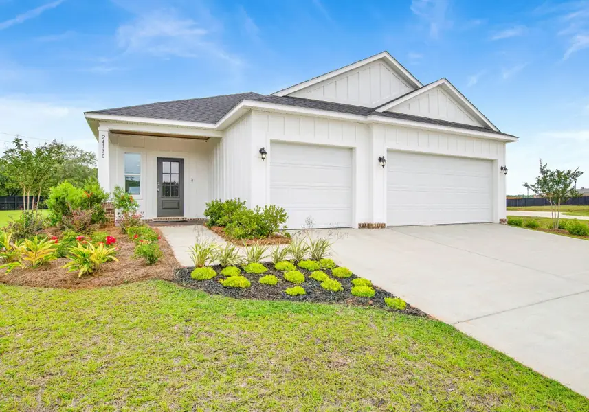 Front exterior of a new home in Hontoon Reserve, Deland, FL, highlighting curb appeal (Image 19).