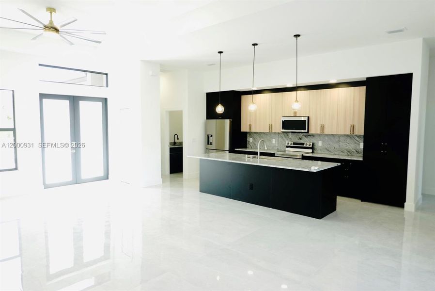 Furnished interior view inside a new home in , Port Charlotte (Image 10).