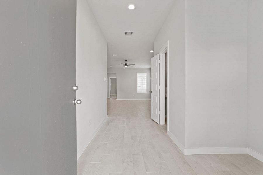 Spacious, unfurnished interior of a new home in Grand Oaks Village, Houston (Image 22).