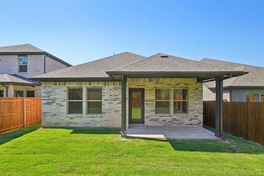 Exterior details and patio area of a home in Eastridge - Spring Series, McKinney (Image 22). Exterior details and patio area of a home in Eastridge - Spring Series, McKinney (Image 22).