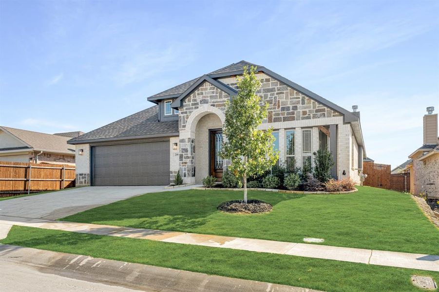 Front exterior of a new home in Sunset Ridge, Alvarado, TX, highlighting curb appeal (Image 2).