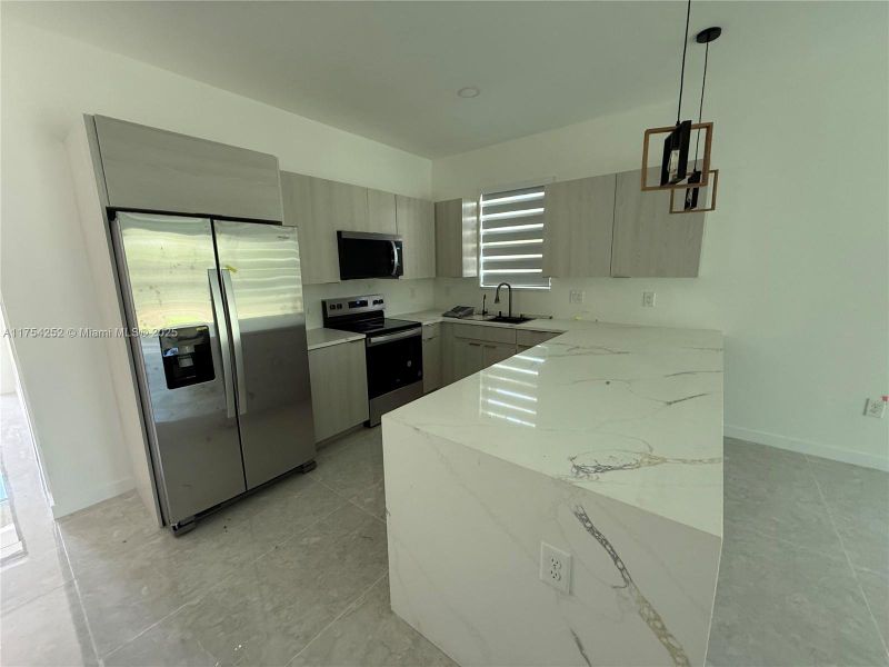 Furnished interior view inside a new home in , Punta Gorda (Image 36).