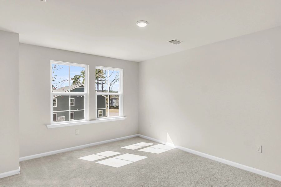 Spacious, unfurnished interior of a new home in Windward Village, Summerville (Image 13).
