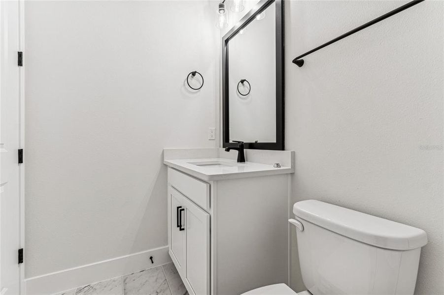 Furnished interior view inside a new home in North River Ranch - Cottage Series, Parrish (Image 18).