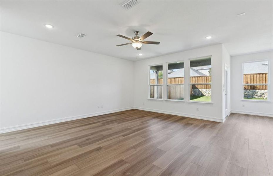 Spacious gathering room with large windows