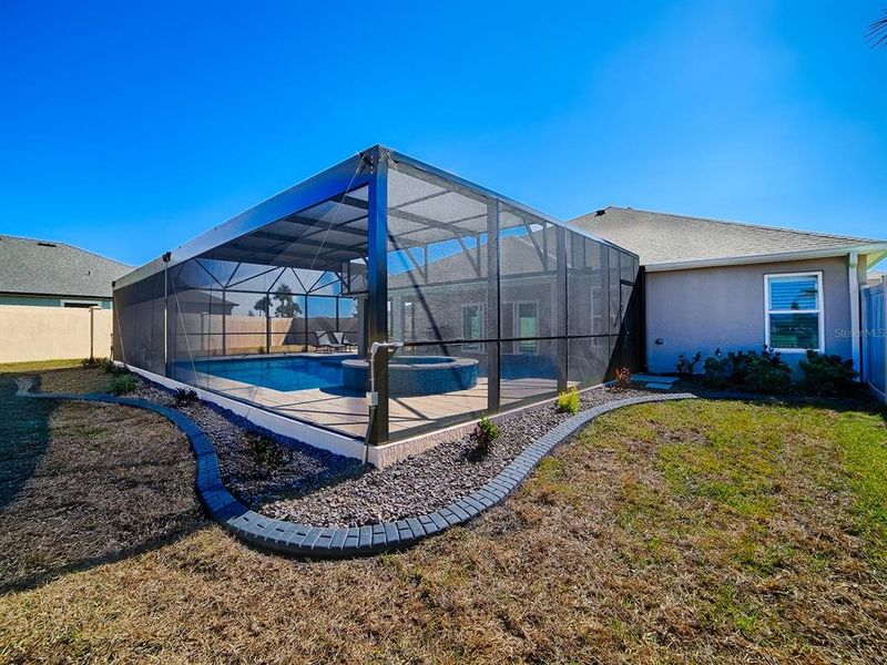 Exterior details and patio area of a home in , The Villages (Image 31). Exterior details and patio area of a home in , The Villages (Image 31).