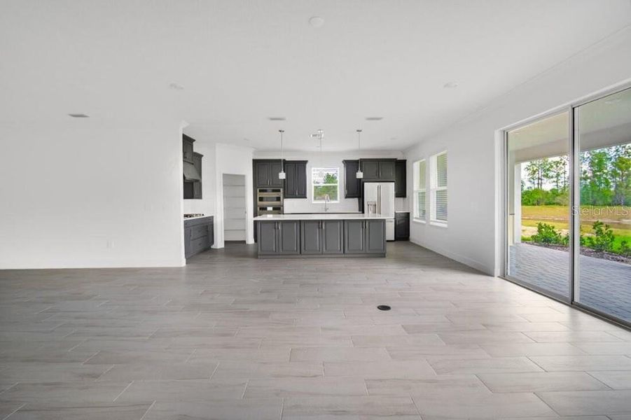 Spacious, unfurnished interior of a new home in Harvest at Ovation, Winter Garden (Image 35).