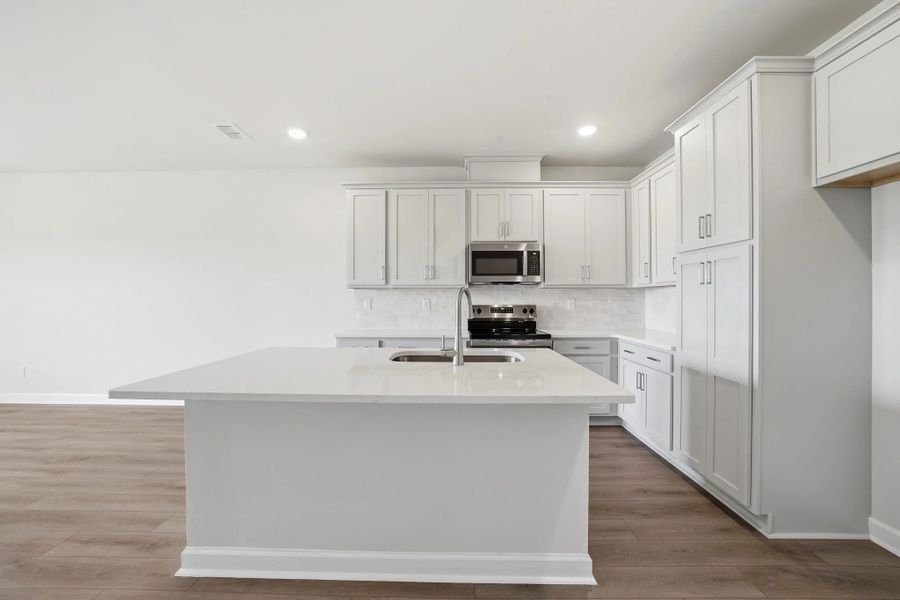 Furnished interior view inside a new home in Blue Heron Retreat, Little River (Image 6).