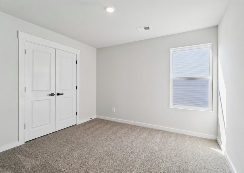 Spacious and open bedroom. Spacious and open bedroom.