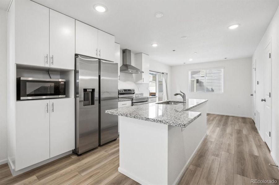 Furnished interior view inside a new home in Reunion, Commerce City (Image 6).