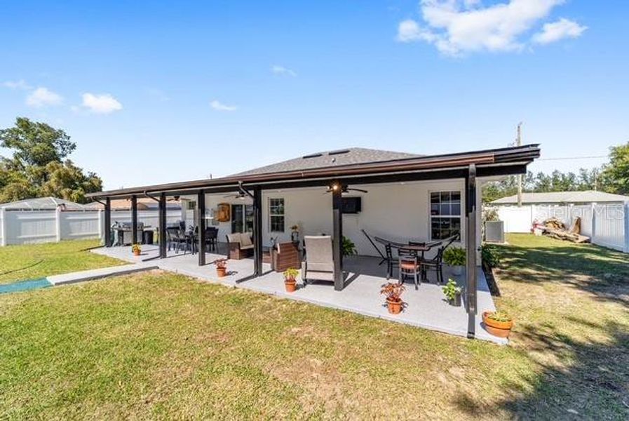 Exterior details and patio area of a home in , Ocala (Image 26).