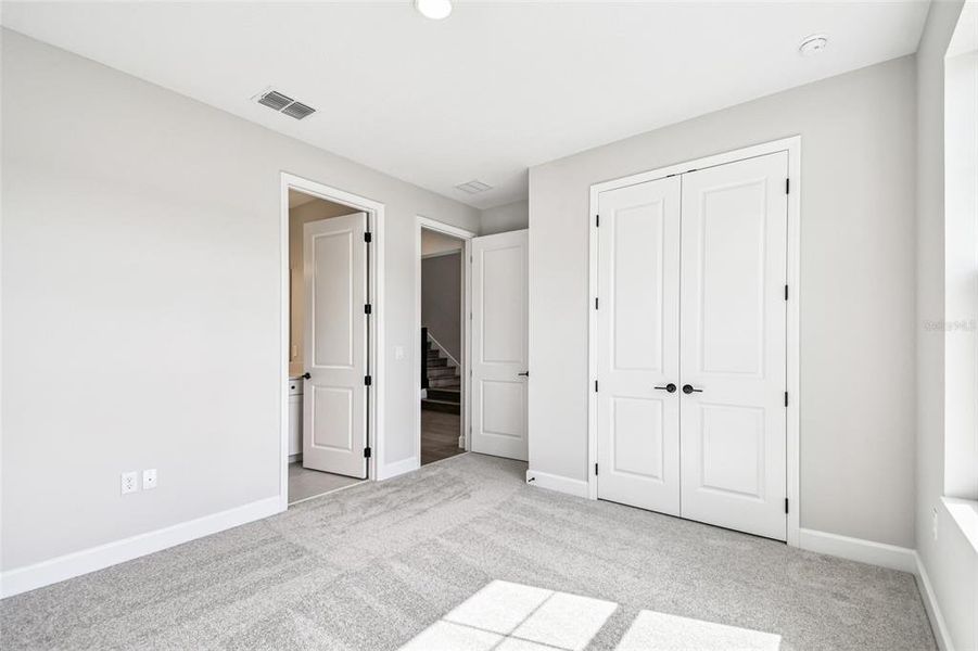 Spacious, unfurnished interior of a new home in Solace at Corner Lake, Orlando (Image 48).