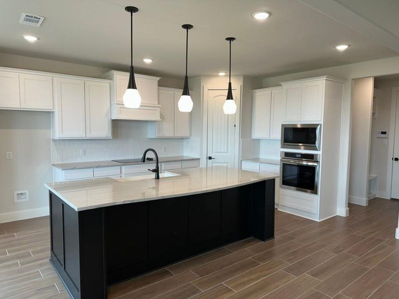 Furnished interior view inside a new home in Fannin Ranch, Leonard (Image 6).