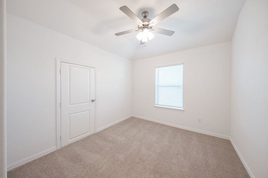 Spacious, unfurnished interior of a new home in The Villages of Hurricane Creek, Anna (Image 26).