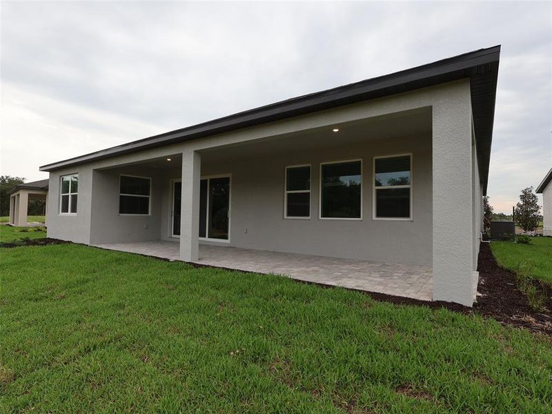 Exterior details and patio area of a home in Creeks Edge at Twin Rivers, Parrish (Image 2). Exterior details and patio area of a home in Creeks Edge at Twin Rivers, Parrish (Image 2).