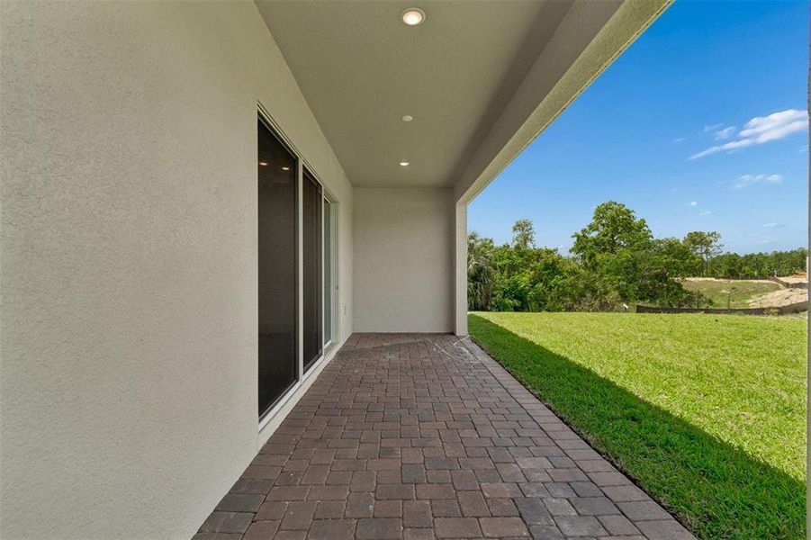 Exterior details and patio area of a home in Osprey Ranch, Horizon West (Image 2). Exterior details and patio area of a home in Osprey Ranch, Horizon West (Image 2).