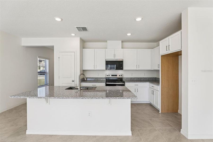 Furnished interior view inside a new home in , Lake Wales (Image 9).