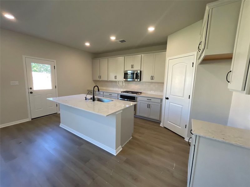 Furnished interior view inside a new home in Covered Bridge, Hutto (Image 13). Furnished interior view inside a new home in Covered Bridge, Hutto (Image 13).