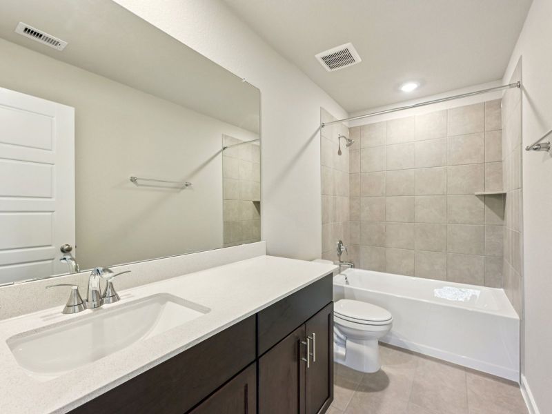 Furnished interior view inside a new home in Stewart's Ranch, Conroe (Image 12).