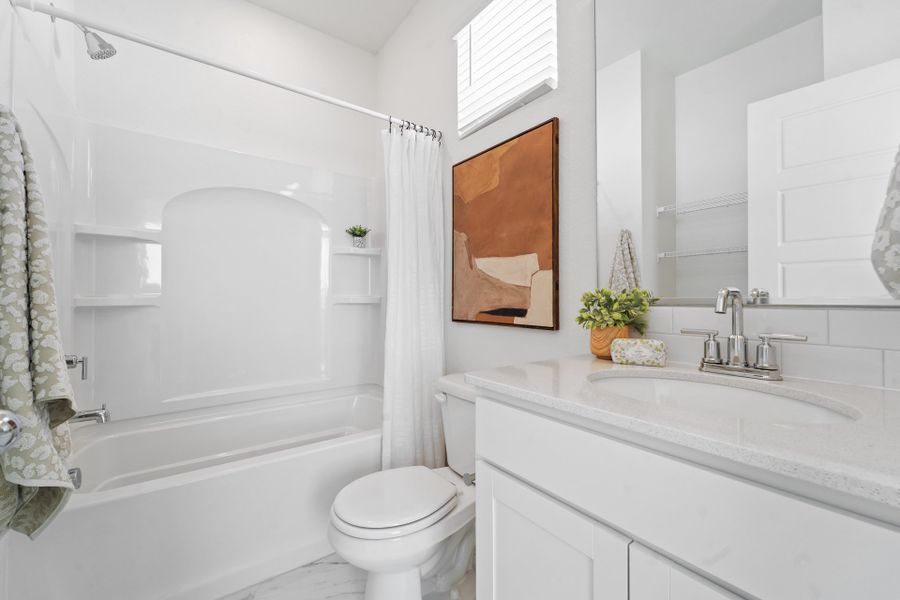 Representative exterior photo of a completed home built from the Telluride by Baessler Homes in Liberty Draw, Evans, CO (Image 32).