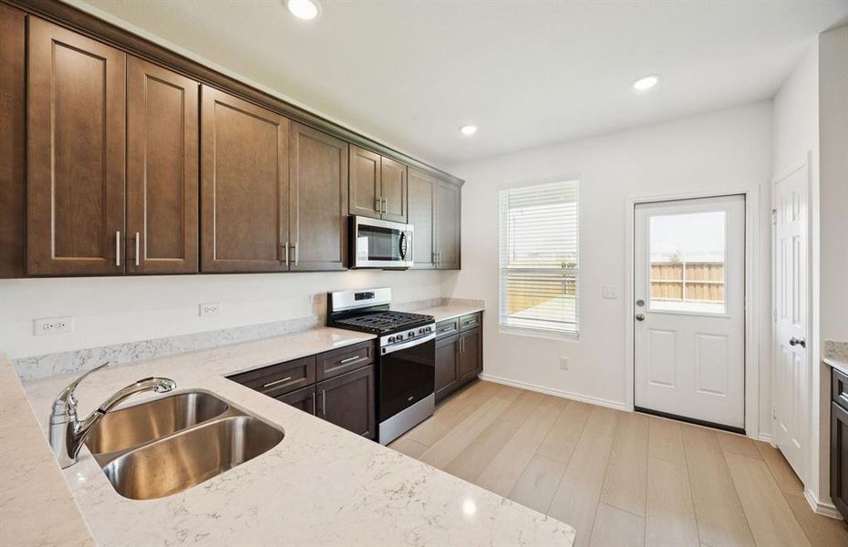 Spacious kitchen with ample cabinet space