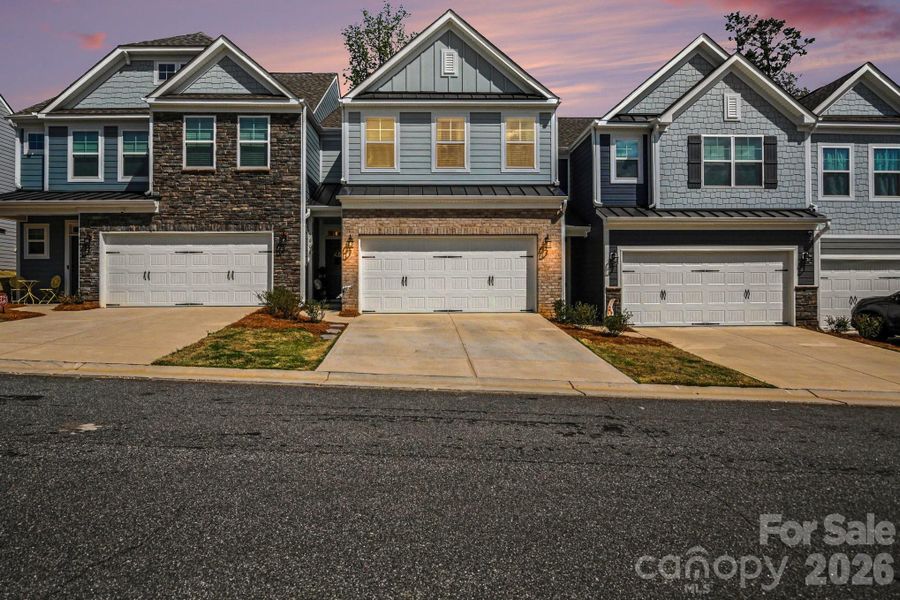 Front exterior of a new home in , Greensboro, NC, highlighting curb appeal (Image 21).