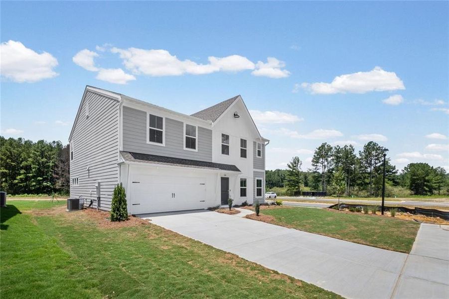 Front exterior of a new home in Three Rivers, Rome, GA, highlighting curb appeal (Image 17). Front exterior of a new home in Three Rivers, Rome, GA, highlighting curb appeal (Image 17).