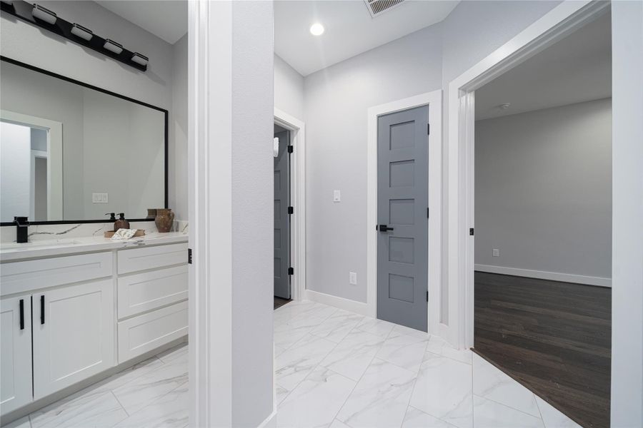 Guest hallway bathroom + Guest quarters on the right Guest hallway bathroom + Guest quarters on the right