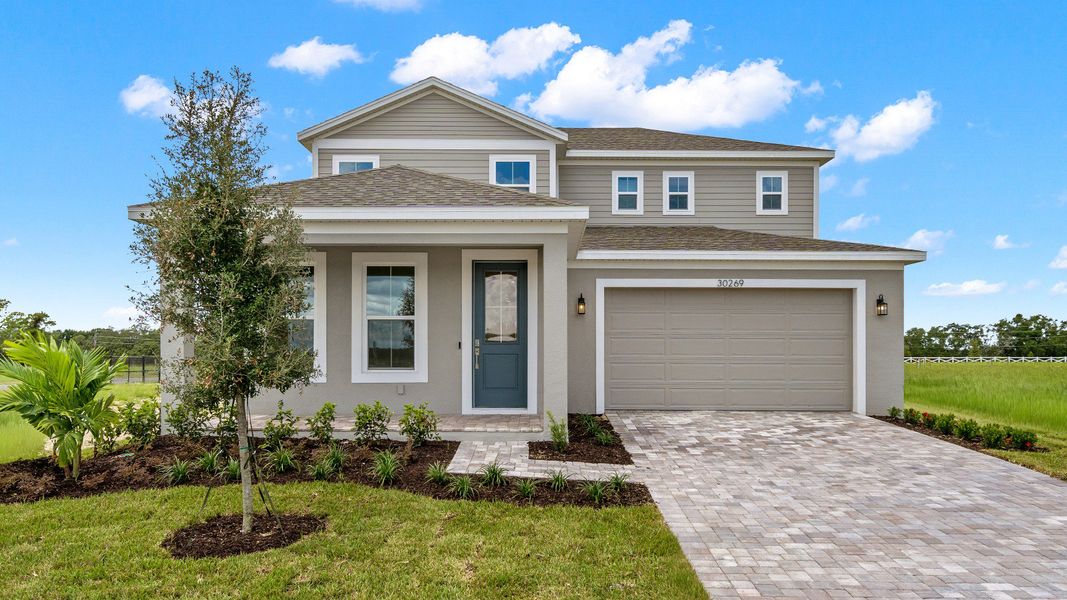 Representative exterior photo of a completed home built from the Sweetgum by DRB Homes in Ardisia Park, New Smyrna Beach, FL (Image 30).