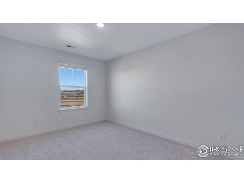 Spacious, unfurnished interior of a new home in Vista Meadows, Fort Lupton (Image 36).