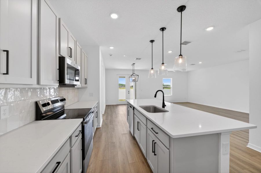 Furnished interior view inside a new home in Catamaran Cove, Rockledge (Image 3).