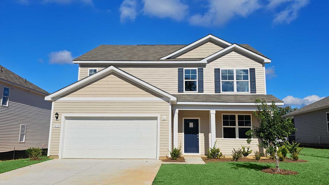 Front exterior of a home in the The Reserve at Wild Horse community, located in Conway, SC (Image 10).