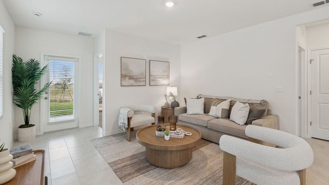 Representative furnished interior of a home built from the Downing II by D.R. Horton in Villamar, Winter Haven (Image 9).