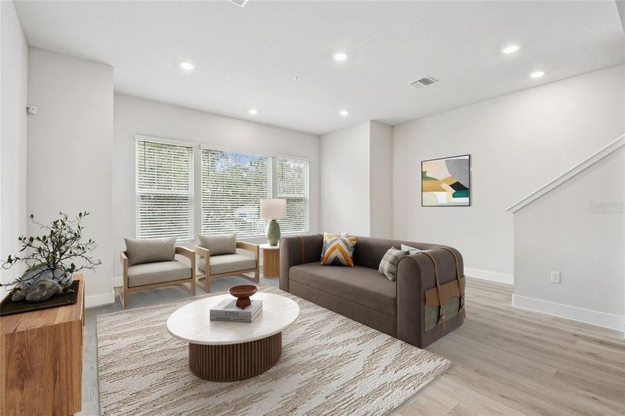 Furnished interior view inside a new home in Towns at Union, St. Petersburg (Image 14).