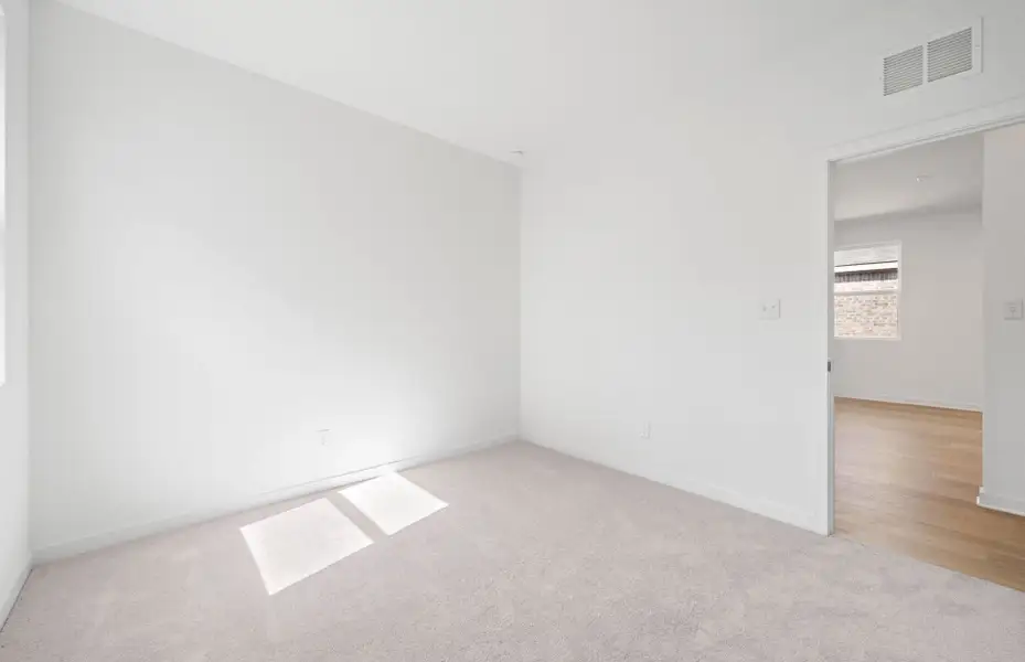 Spacious, unfurnished interior of a new home in Sunfield, Buda (Image 12). Spacious, unfurnished interior of a new home in Sunfield, Buda (Image 12).