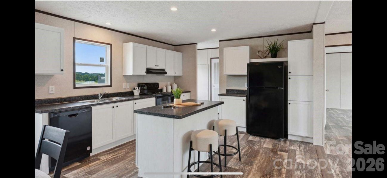 Furnished interior view inside a new home in , Forest City (Image 3).