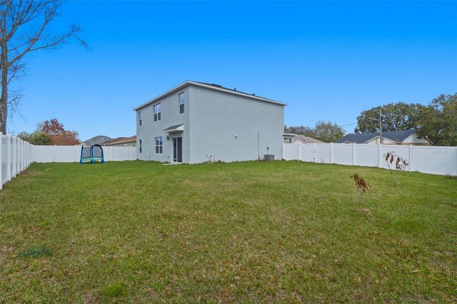 Exterior details and patio area of a home in Poinciana Enclave, Kissimmee (Image 22).