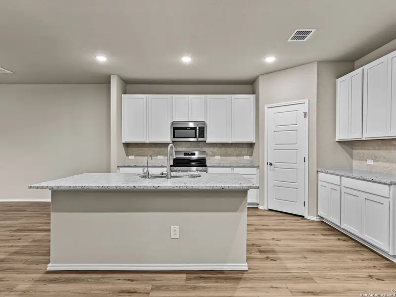 Furnished interior view inside a new home in Royal Crest, San Antonio (Image 8).