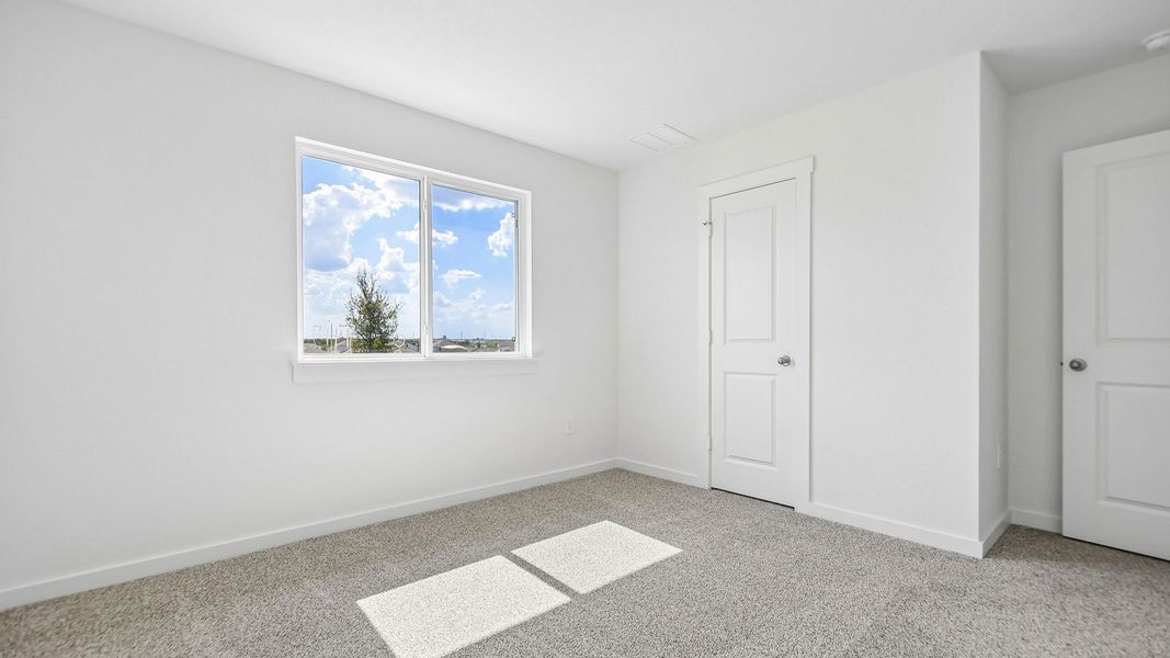 Spacious, unfurnished interior of a new home in Trails at Wildhorse, Austin (Image 32).