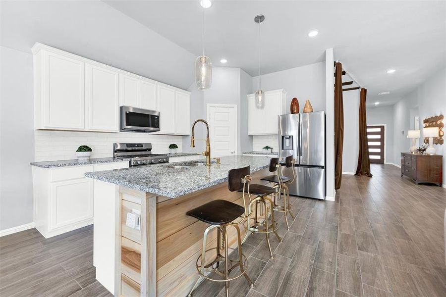 Furnished interior view inside a new home in Woodstone, Providence Village (Image 8). Furnished interior view inside a new home in Woodstone, Providence Village (Image 8).