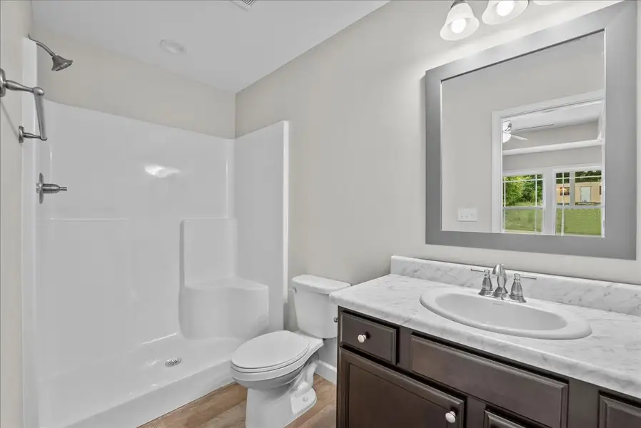 Representative furnished interior of a home built from the Lyman by Enchanted Homes in Lonesome Dove, San Antonio (Image 11).