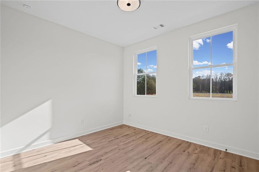 Spacious, unfurnished interior of a new home in The Village at River Green, Canton (Image 26).