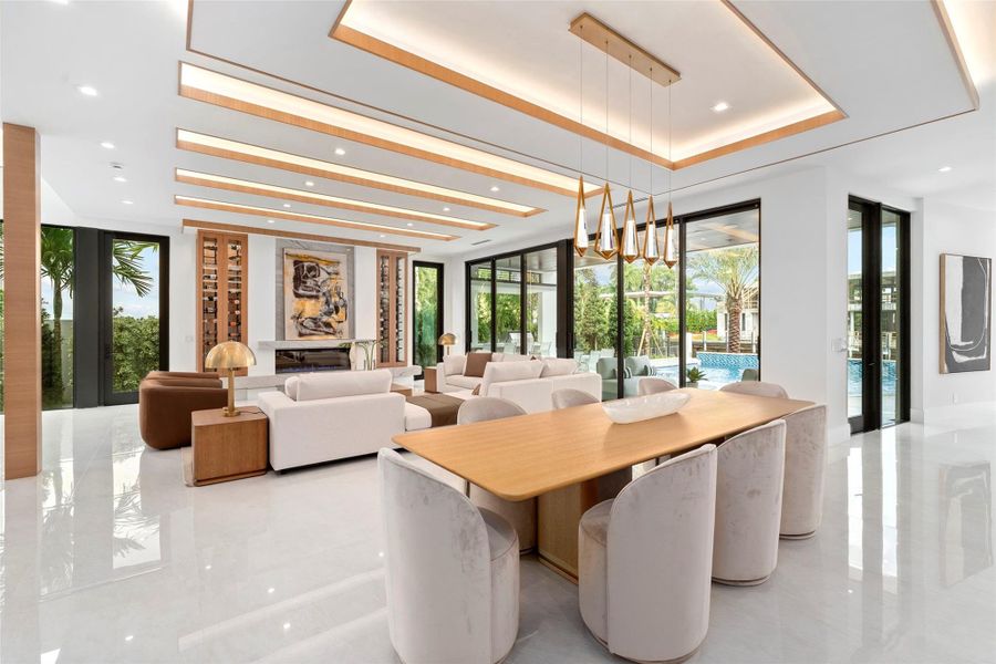 Rich finishes, custom millwork, and refined architectural details create a timeless ambiance. Just minutes from the ocean and downtown Las Olas,