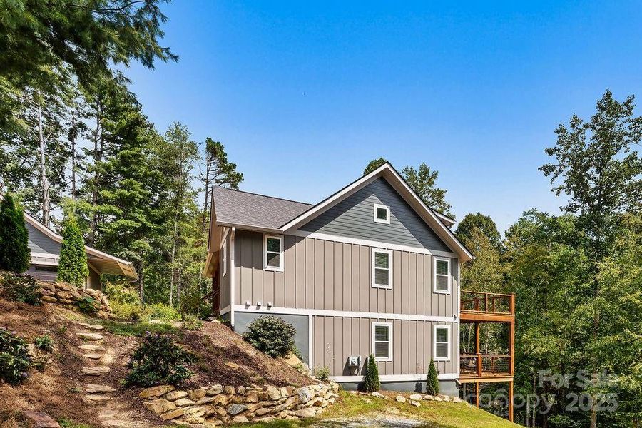Front exterior of a new home in , Hendersonville, NC, highlighting curb appeal (Image 23).