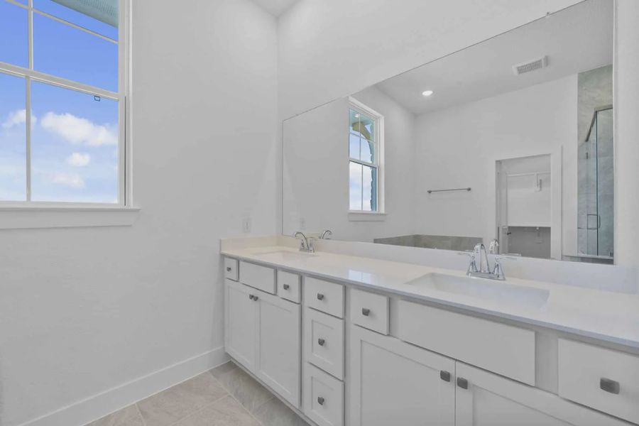 Representative furnished interior of a home built from the Cheverny by Chesmar Homes in Bridgeland Chateau, Cypress (Image 7).