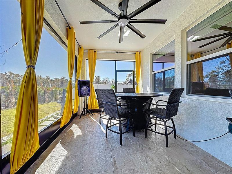 Exterior details and patio area of a home in Bridgewalk, St. Cloud (Image 32).