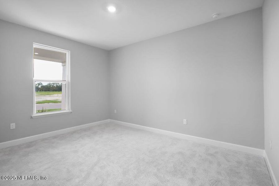 Spacious, unfurnished interior of a new home in Colbert Landings, Palm Coast (Image 25).
