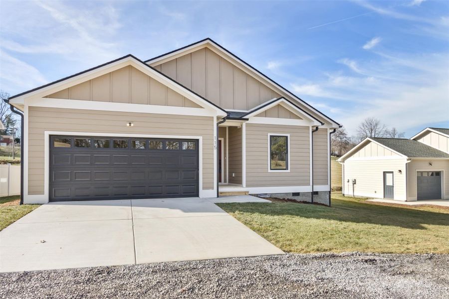 Front exterior of a new home in , Clyde, NC, highlighting curb appeal (Image 20). Front exterior of a new home in , Clyde, NC, highlighting curb appeal (Image 20).