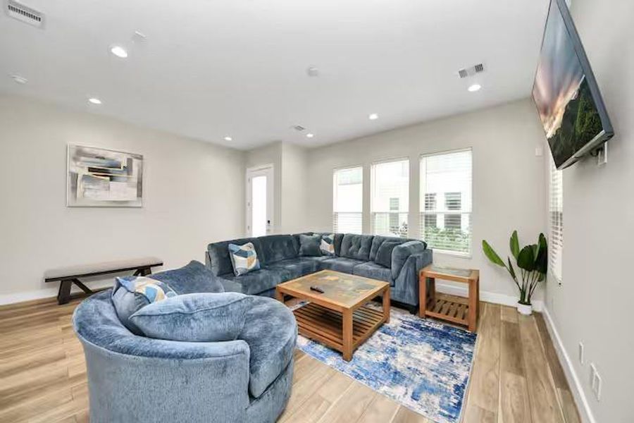 Natural light fills the open living area, giving you plenty of room to relax, host friends, or simply settle in after a long day.